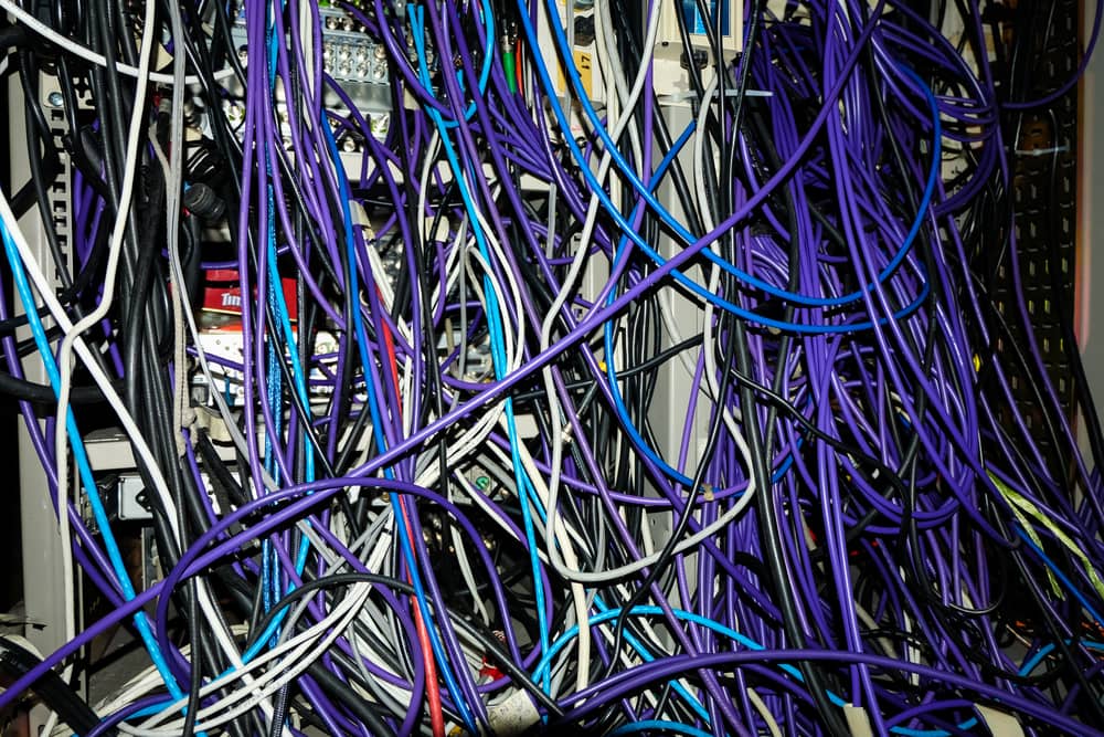What are common signs of outdated network cabling